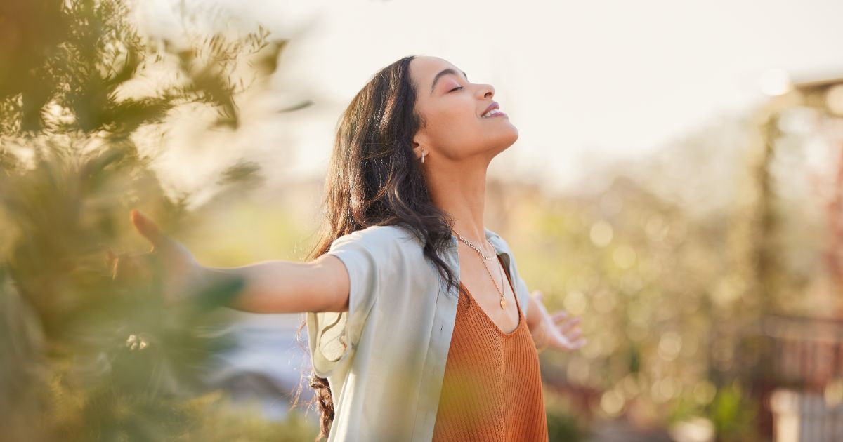 A woman relaxing after her TMS therapy in Chester County, PA at MooreWays with locations in Exton, PA, and Media, PA