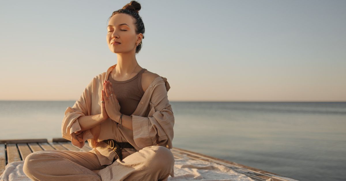 Woman meditatin after PTSD treatment in Chester County, PA at Mooreways Exton, PA Locatoni.